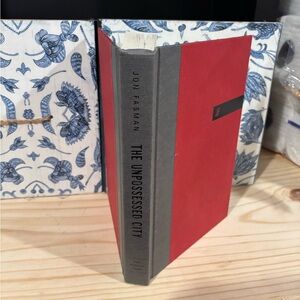 Jon Fasman The Unpossessed City: A Novel Red and Gray Hardcover Book